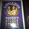 Little Miss Whiskey's Golden Dollar